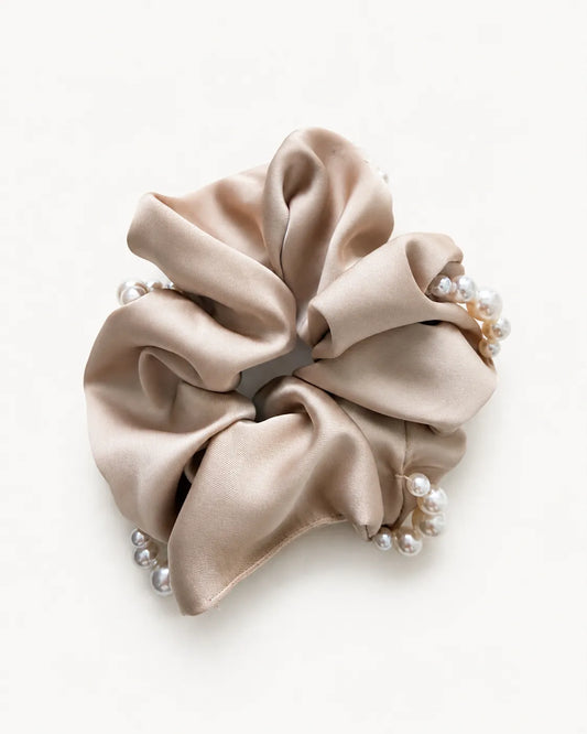 ⁠YANOVA oversized champagne polyester satin scrunchie adorned with delicate faux pearls for women.⁠